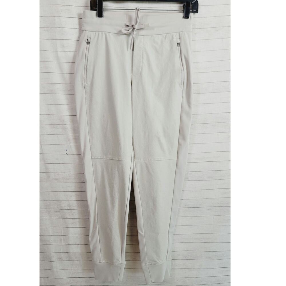 ATHLETA HEADLANDS HYBRID TREK JOGGER PANTS IN BONE WHITE, SZ 4